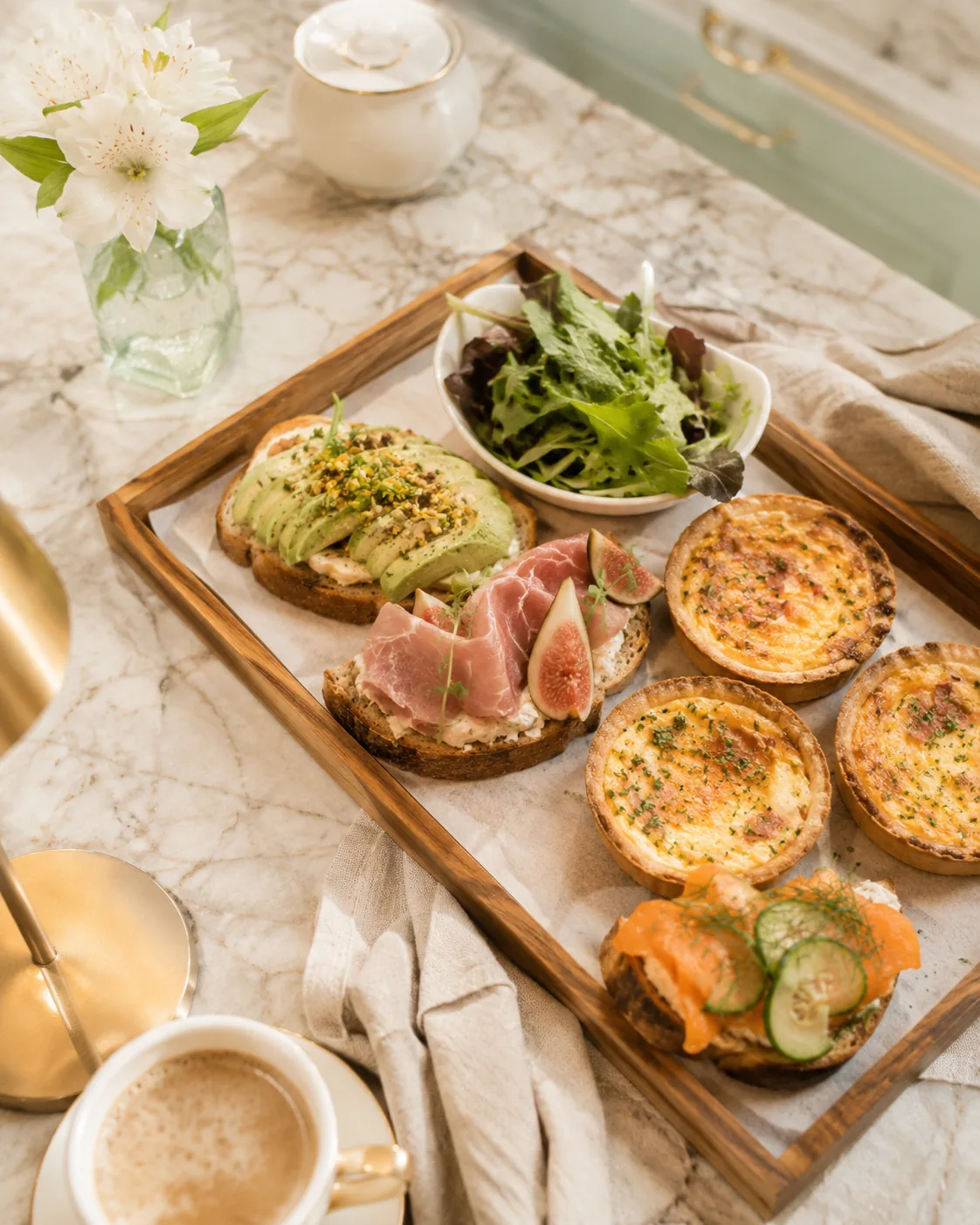 Platter of tartines, quiches and salad — the French-style lunch break